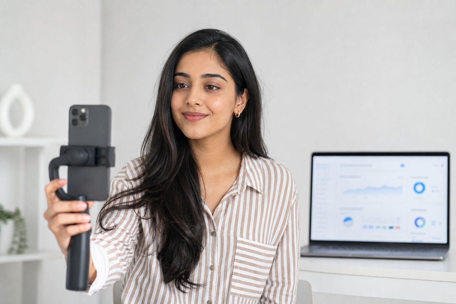 TikTok creator reviewing rising engagement metrics and video reach on a mobile dashboard